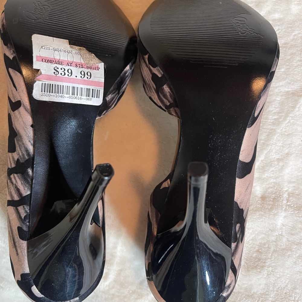 Peep toe leopard heels.  Carlos